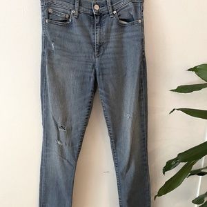 Distressed straight jeans